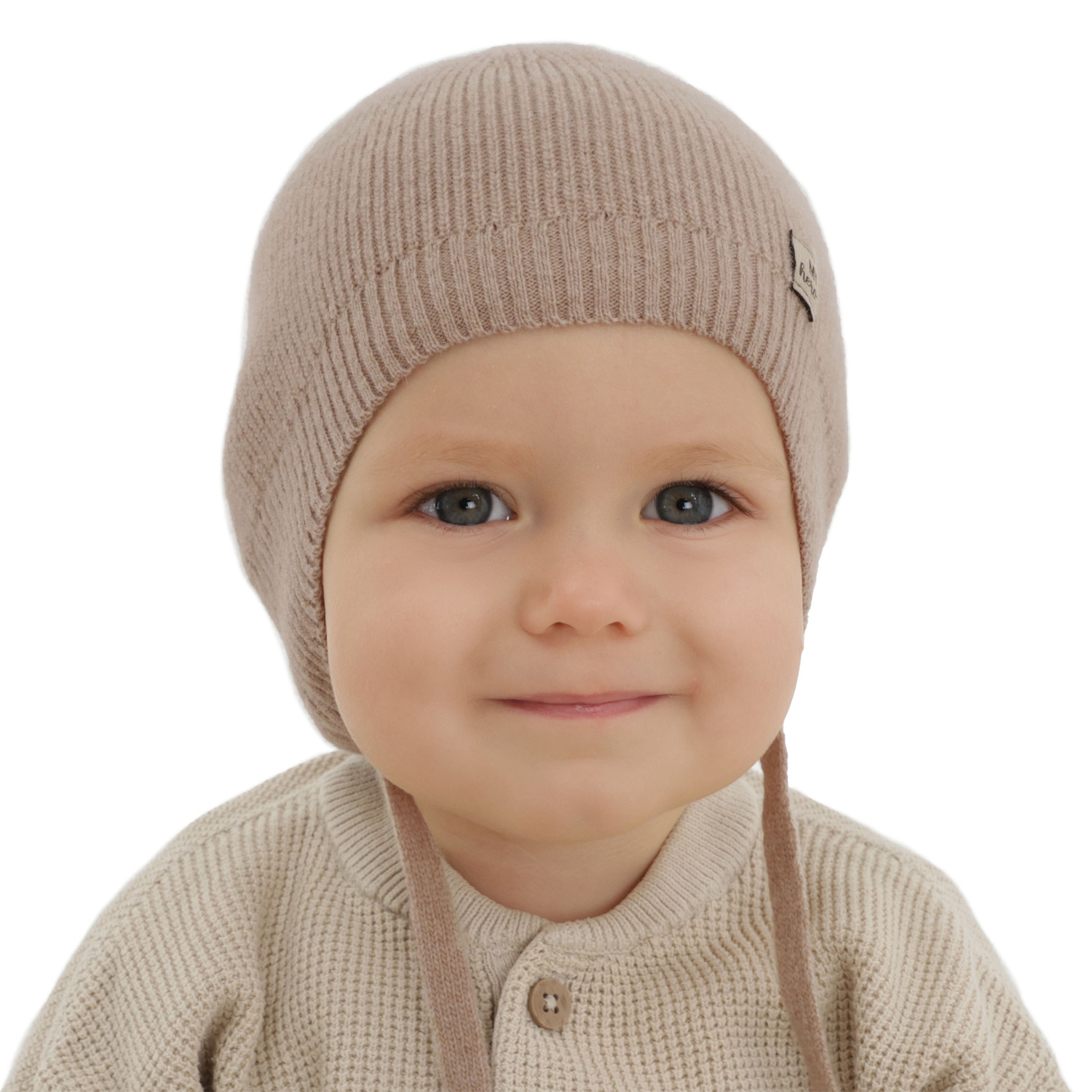 Berretto autunno/primavera bambino, beige chiaro, lana merino con cashmere, con lacci, Tono
